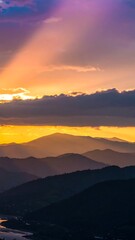 Obraz premium Colorful sunset over mountain ranges