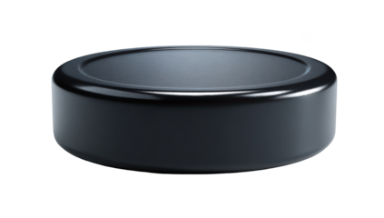 Close-up of a glossy, circular hockey puck, isolated on black background