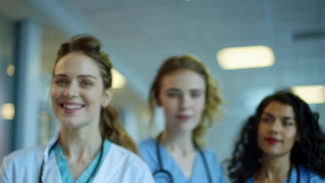 Healthcare professionals collaborate in a modern hospital setting showcasing teamwork and care