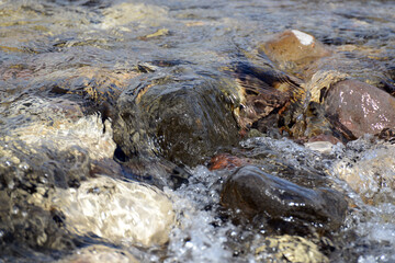 water flowing on the rocks