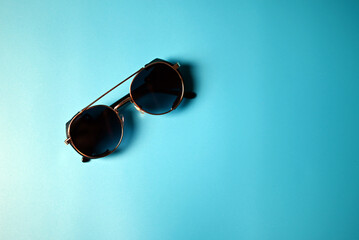 vintage sunglasses on blue background