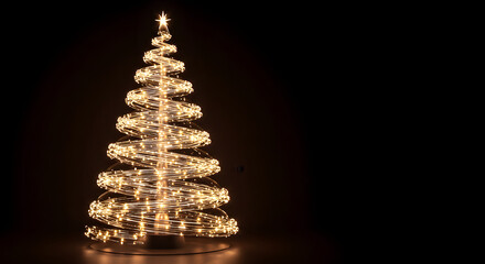 Elegant spiral Christmas tree with warm glowing lights for holiday season celebration