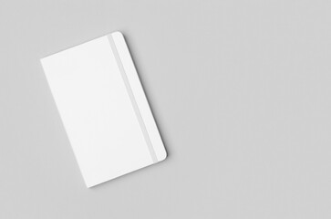 White hardcover notebook mockup on neutral background