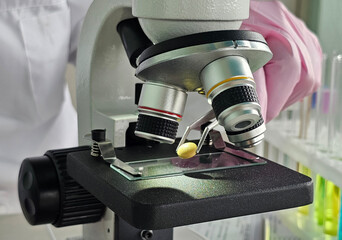 Close view of a microscope in a laboratory during a research experiment