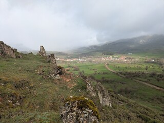 ruins of the old fortress in the mountains over valley