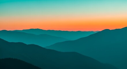 Fototapeta premium Layers of mountains are seen at sunset with a gradient sky background