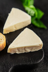 Processed cheese spread portion size cheese for sandwich tasty snack fresh delicious gourmet food background on the table rustic food top view copy space