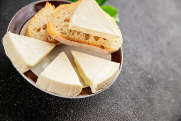Processed cheese spread portion size cheese for sandwich tasty snack fresh delicious gourmet food background on the table rustic food top view copy space
