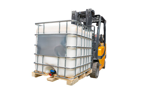 Forklift with IBC container on pallet in warehouse logistics