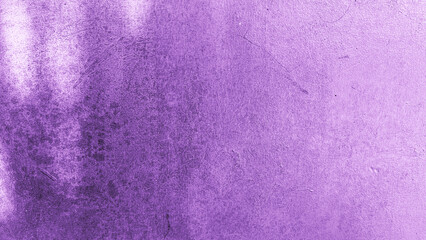 Close-up of a purple painted wall with visible grunge stains and subtle scratches