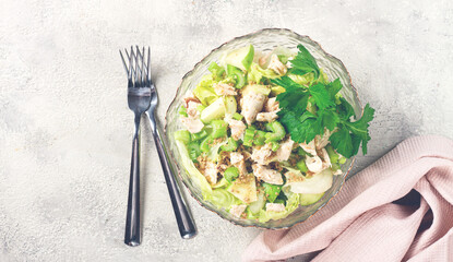 Waldorf salad, celery salad with apple, in a glass salad bowl, natural light, homemade, no people,