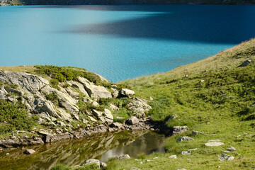 incredible turquoise lake in the mountains