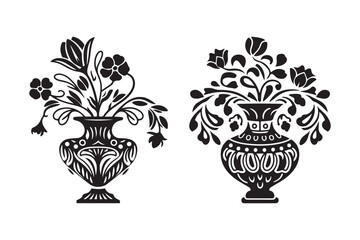 Two ornate black and white vases filled with stylized floral arrangements