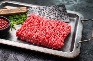 Uncooked Raw beef  mince meat, forcemeat, in kitchen tray ready for cooking.