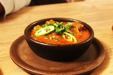 chashushuli in a clay plate Georgian dish side view