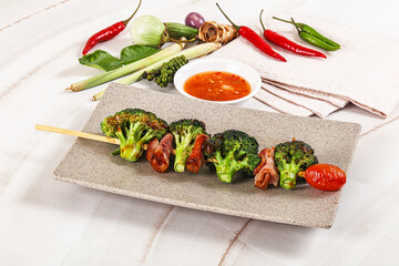 Thai Street foof satay with bacon and broccoli
