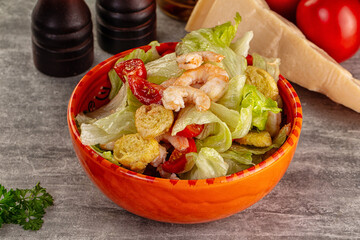 Tasty caesar salad with prawn