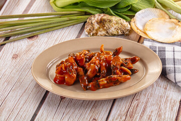 Razor shell mollusk with sauce