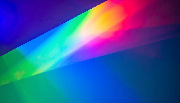 Colorful light beams intersecting on a dark background