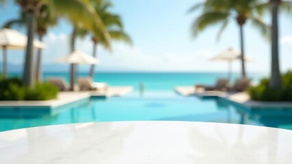 Beachfront table top, sunny day, sunset villa with infinity swimming pool. blurred blue ocean view