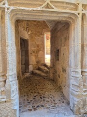 Medieval portal in Puy l'Eveque, Lot, France