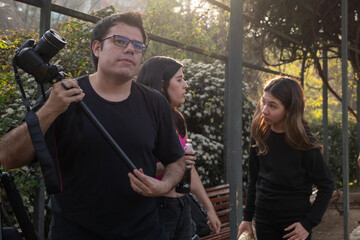 Photographer and group portrait at the park