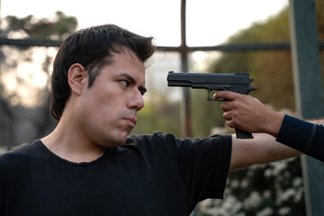 Man threatened with a gun