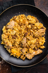 Traditional Central Asian dish Chon Kemin Valley. brown background. top view