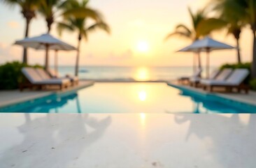 Beachfront table top, sunny day, sunset villa with infinity swimming pool. blurred blue ocean view