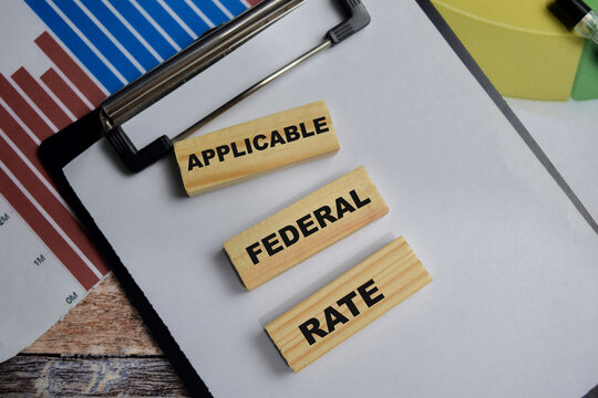 Concept of Applicable federal rate. Wooden block with words Applicable federal rate. Business and finance concept