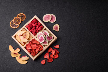 Box of dried fruits strawberries, raspberries, figs and peaches. Dried fruits