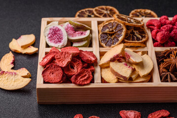 Box of dried fruits strawberries, raspberries, figs and peaches. Dried fruits