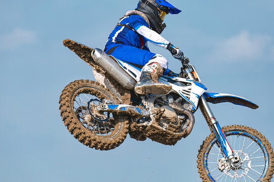 Motocross racer performing a high jump