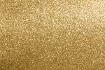 Sparkling gold glitter background suitable for festive and elegant designs or events
