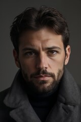 Obraz premium Intense Man with Beard and Blue Eyes