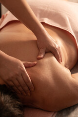 Relaxing massage therapy session. Therapeutic massage for relaxation. Professional spa body massage. Wellness and spa massage treatment.