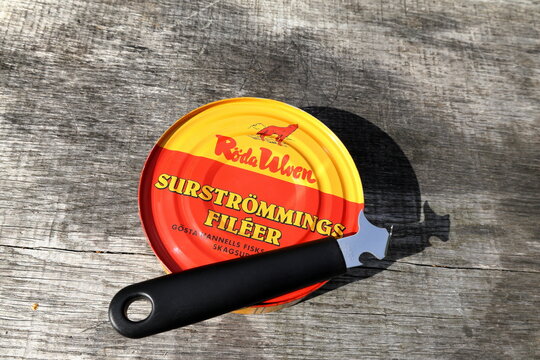 Sour herring tin with can opener. Called surstr&ouml;mming in Swedish. From R&ouml;da Ulven. Eat outside.  Stockholm, Sweden.