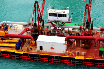 Caribbean Scene with working ship