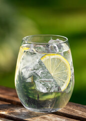 glass of water with ice and lemon