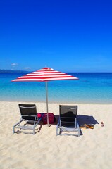 lounge chairs on the beach