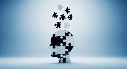 Silhouette of a human head formed by puzzle pieces, with scattered pieces floating above