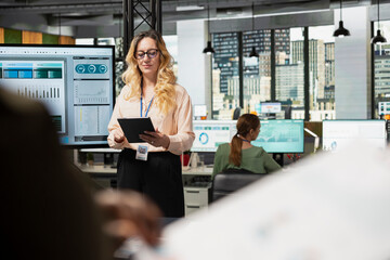 Successful entrepreneur working on career development at the company office, establishing...