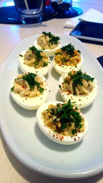 Deviled eggs arranged on a plate