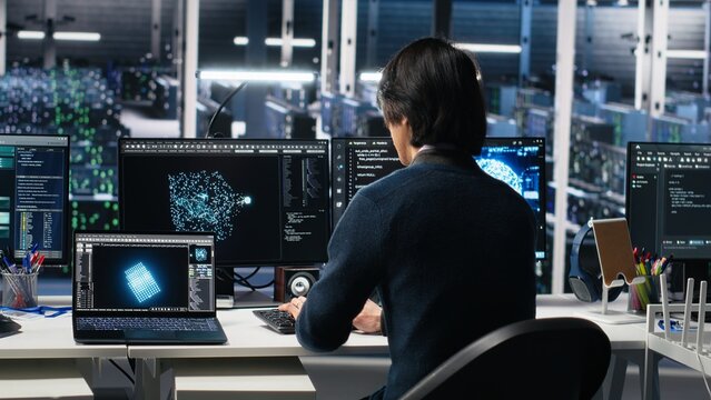 Programmer entering server room office, using AI to review infrastructure diagnostics. IT admin in data center high tech facility analyzes performance data using artificial intelligence tech, camera A - Powered by Adobe