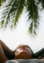 Feet in Hammock Under Palm Trees: Tropical Relaxation