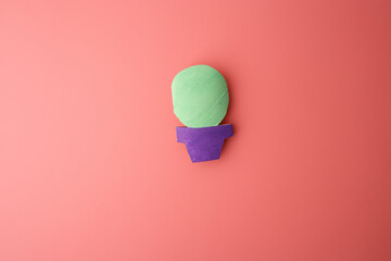 DIY cactus paper craft in progress, perfect for school programs, art teachers, creative lesson visuals, and educational content focused on handmade activities, top view © Elena