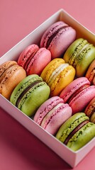 Colorful macarons in a white box