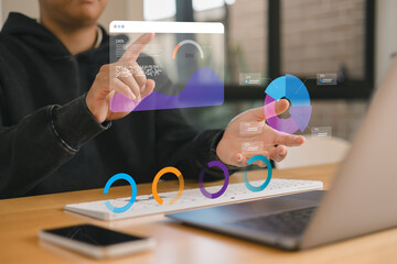 Businessman using futuristic augmented reality interface with data analytics dashboard, charts, and graphs for digital marketing, finance business strategy planning.