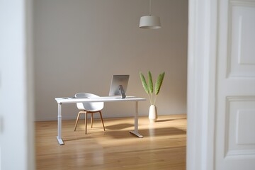 Modern minimalist home office with white desk chair and plant bathed in warm sunlight