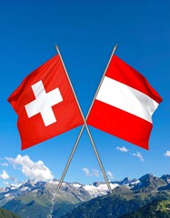 Crossed flags of Switzerland and Austria over mountains